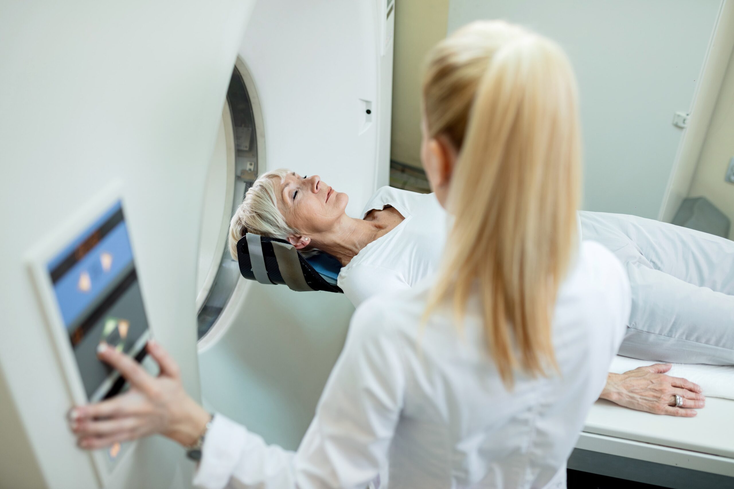 woman in ct machine