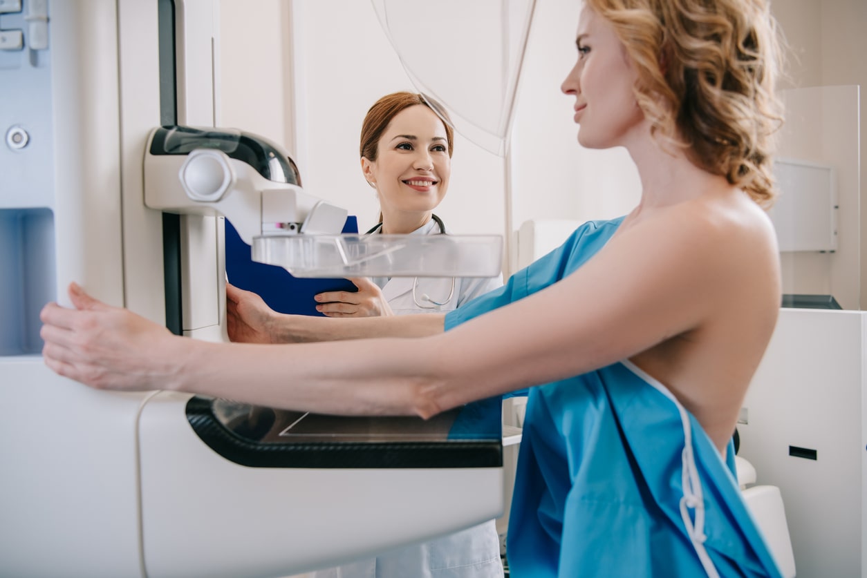 woman about to have a mammogram