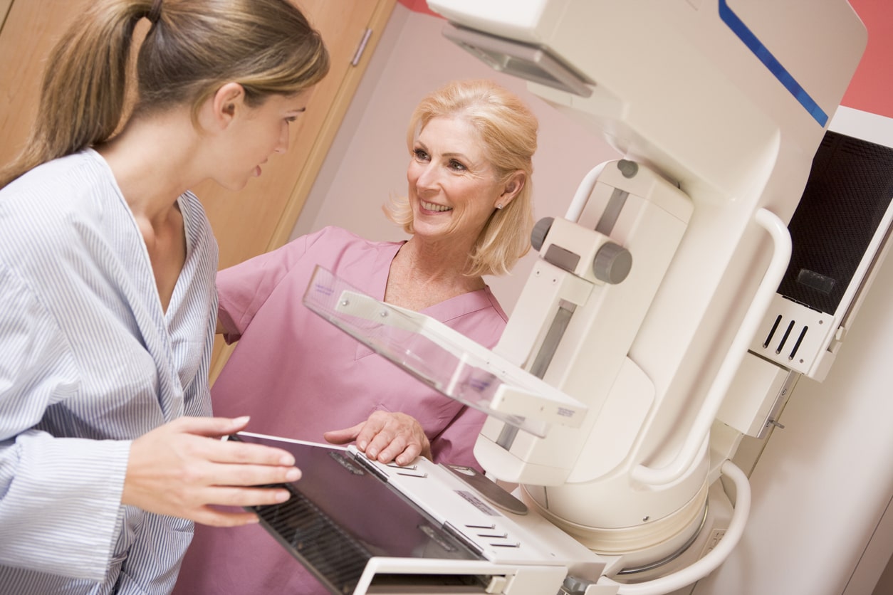 woman getting mammogram